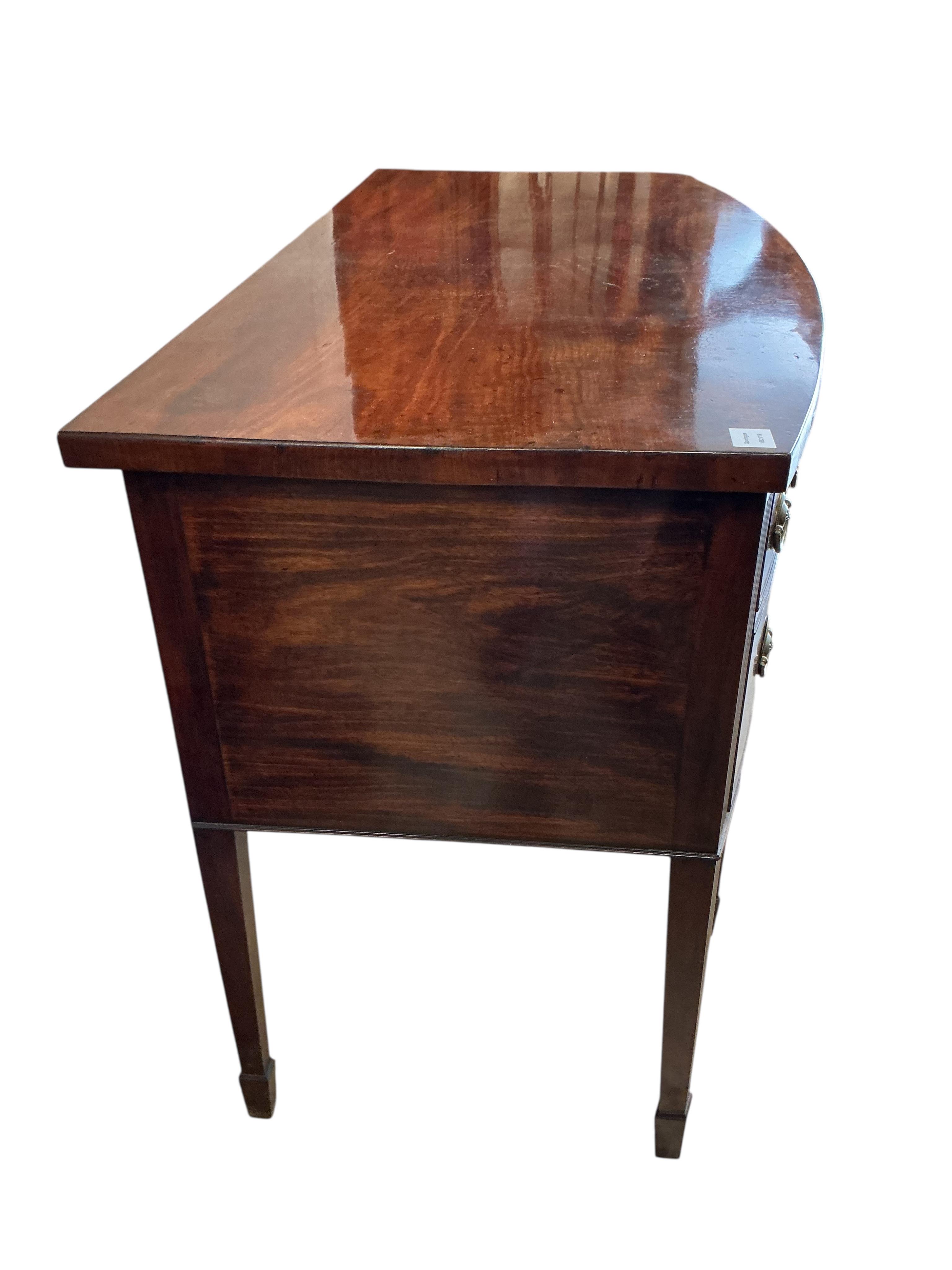 A small George III mahogany bowfront sideboard, width 138cm, depth 68cm, height 91cm